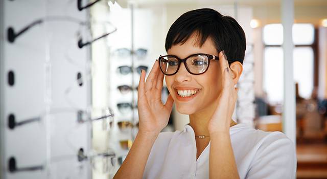 Woman Trying on Glasses